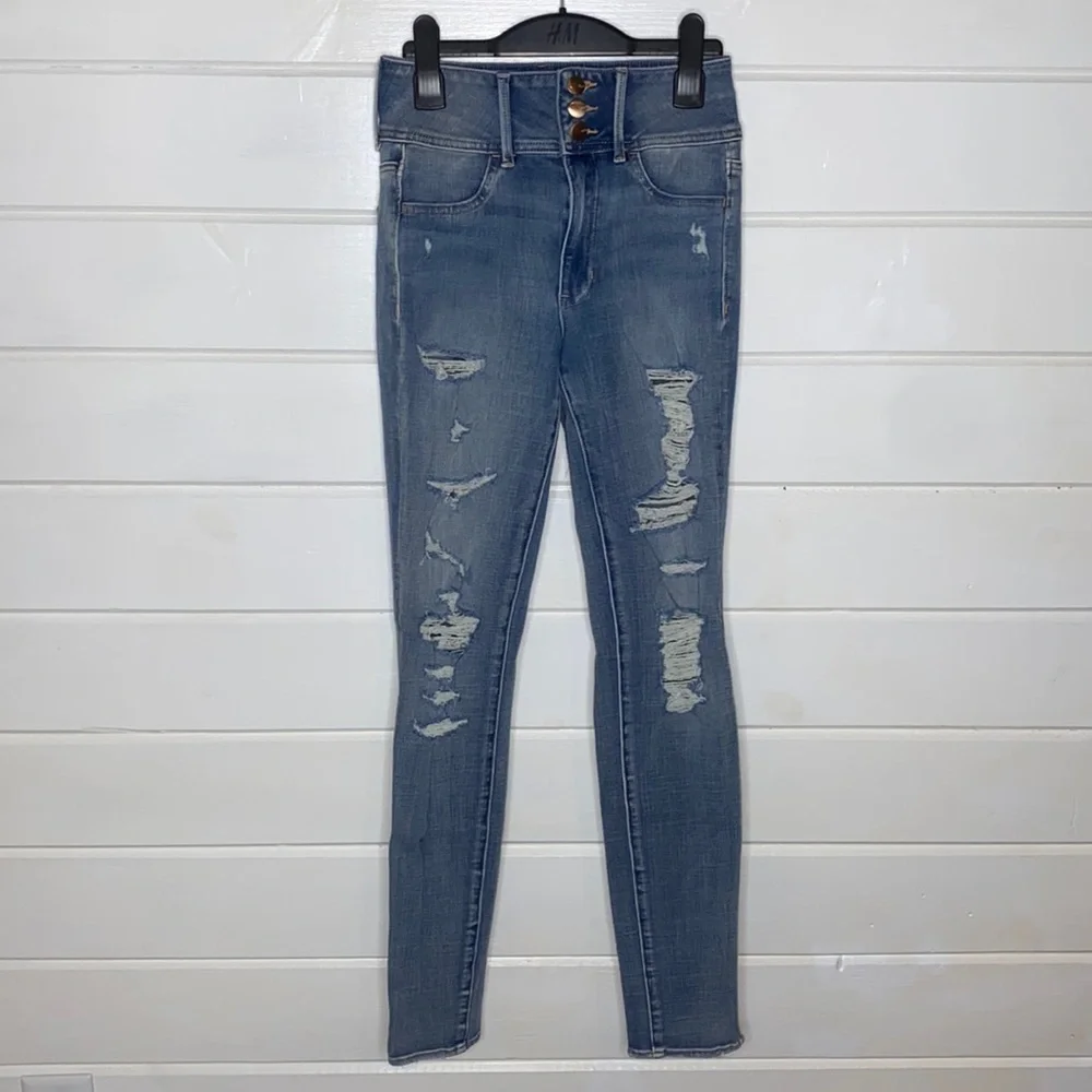 American Eagle super hi rise distressed skinny jeans